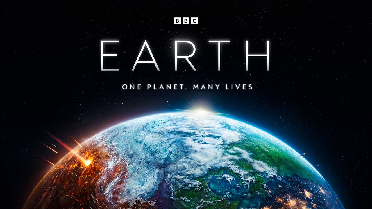 Text: BBC. Earth. One planet, many lives. Picture: A hemisphere of the earth is visible, one part showing the lights of cities at night, another part being covered by clouds brightened by daylight, another part being struck by meteors. The sun is rising above its horizon.